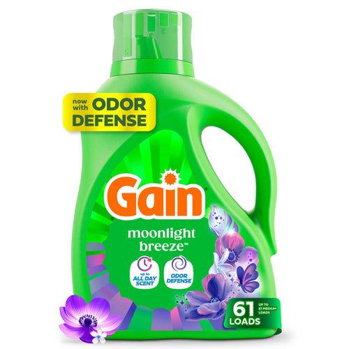 Green Gain liquid detergent bottle labeled Moonlight Breeze with floral artwork and 61 loads badge