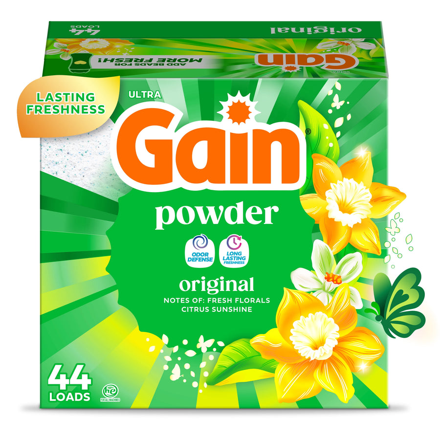Front-facing Gain powder laundry detergent box with green sunburst design and yellow floral artwork