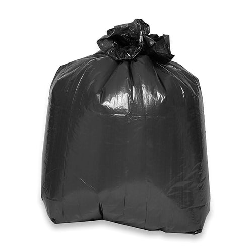 Genuine Joe black low-density trash bag, filled and tied at the top, photographed on a white background.