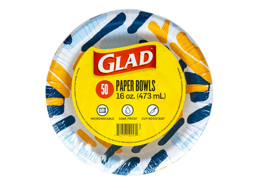 Packaged Glad paper bowl with yellow product label showing 16 oz and scribble abstract blue and yellow pattern