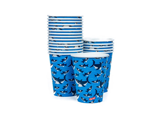 Multiple stacked blue Glad paper cups with shark pattern, some cups separated and fanned in front