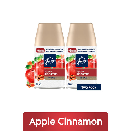 Two Glade Apple Cinnamon automatic spray refill cans with apple and cinnamon graphics and a 'Two Pack' badge