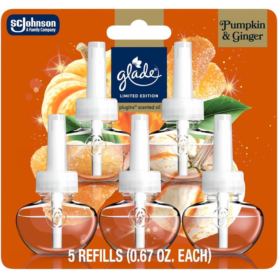 Glade PlugIns refill blister pack showing five scented oil refills on orange pumpkin-and-spice themed backing