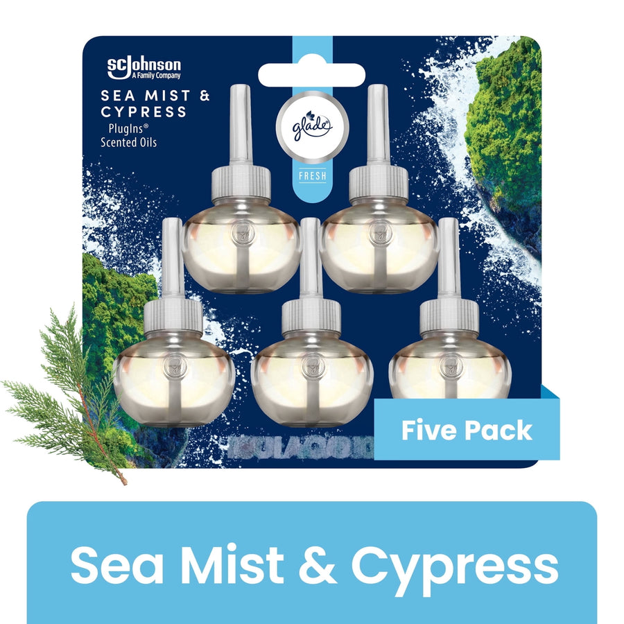 Five-pack blister pack of Glade PlugIns Sea Mist & Cypress scented oil refills on navy ocean-themed backing