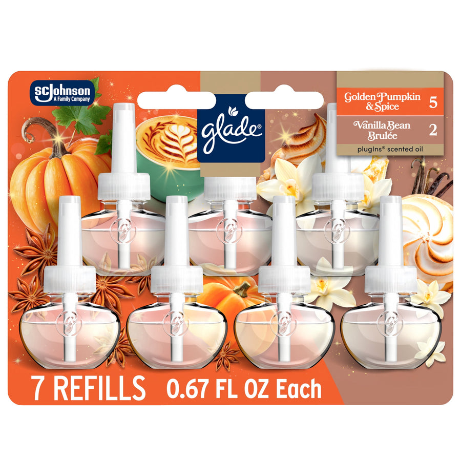 Glade branded blister pack showing seven transparent scented oil plug-in refills with pumpkin and vanilla imagery