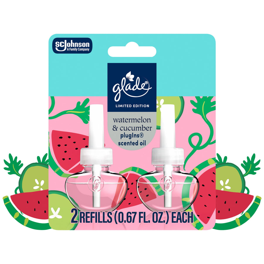 Glade limited edition plug-ins refill twin pack with watermelon and cucumber graphics and two clear scent bottles on illustrated background.