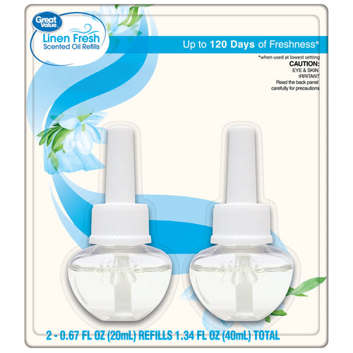 Retail blister pack showing two clear Great Value linen-scent plug-in oil refill bottles with floral blue packaging accents.
