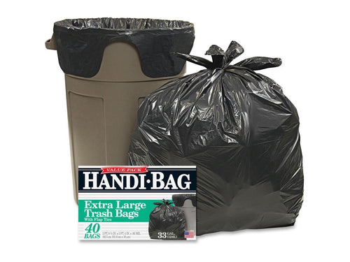 Handi-Bag branded box with a tied black trash bag and a black-lined beige wastebasket, product display