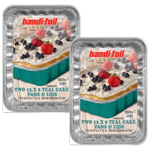 Two retail-packaged Handi-Foil teal 13x9 cake pans side by side showing branded front labels