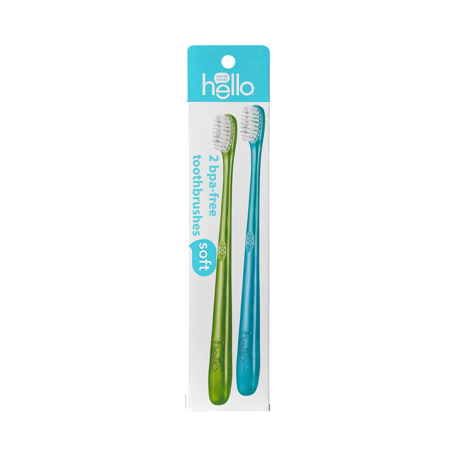 White blister-style package showing two hello soft toothbrushes, one green and one blue, on a white card