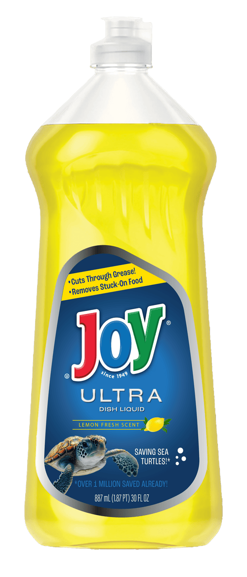 Close-up studio photo of a clear bottle of yellow Joy Ultra dish liquid with blue label and lemon graphic