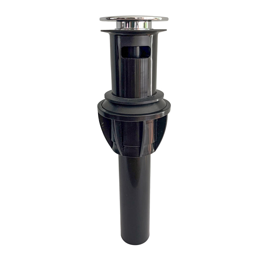 Close-up of a black plastic push-button sink drain with chrome pop-up cap and tailpiece