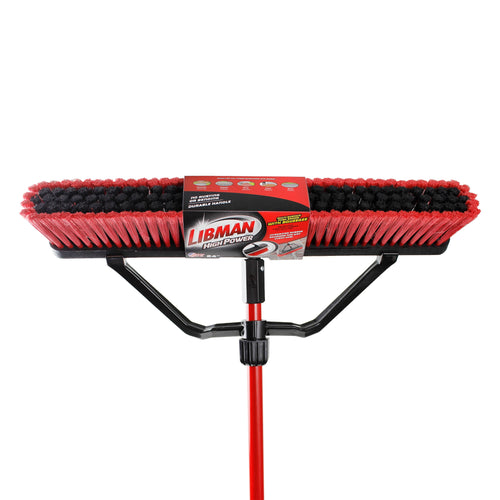 Front-facing Libman High Power push broom with packaging band around the red bristles