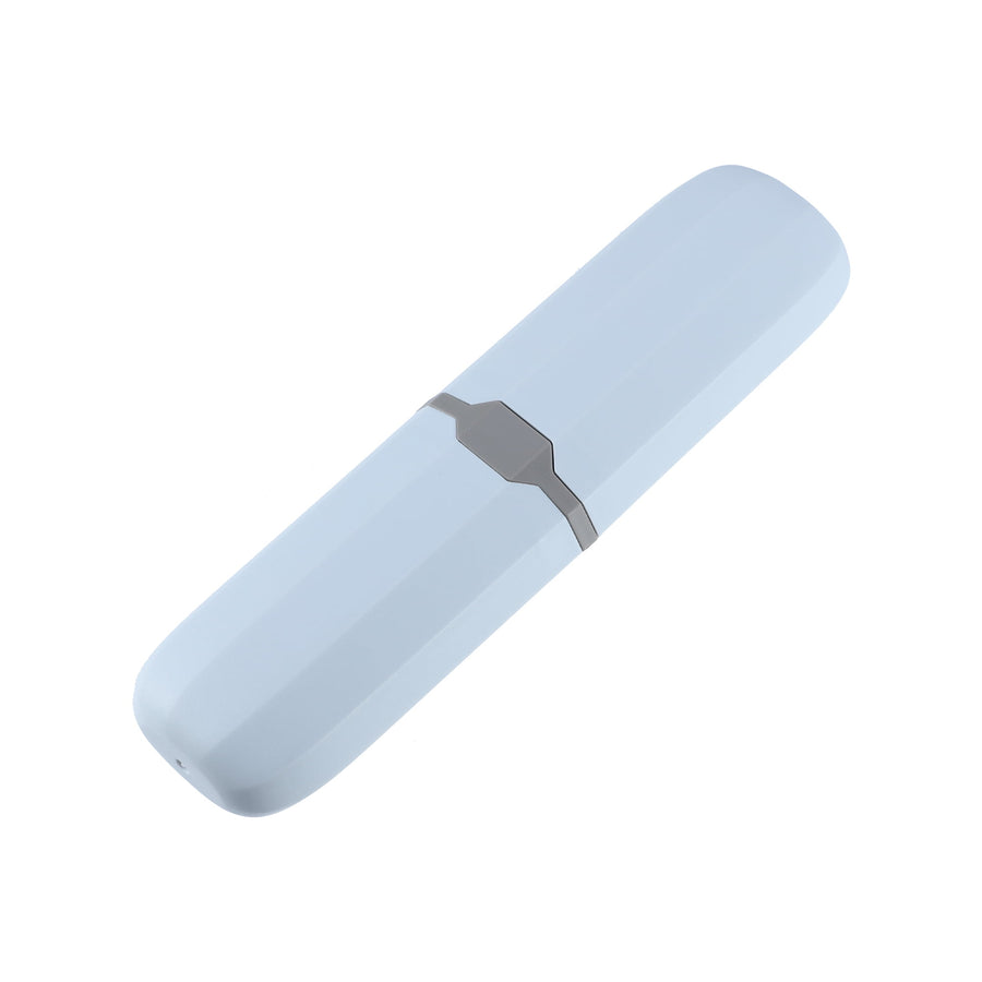 Light blue hard plastic travel toothbrush case with central gray latch on white background