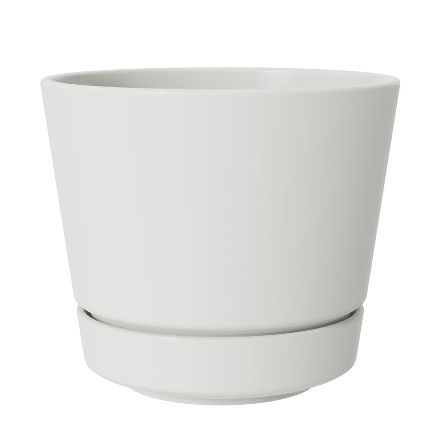 Vanilla-colored round plastic planter with attached saucer shown on white background, front view