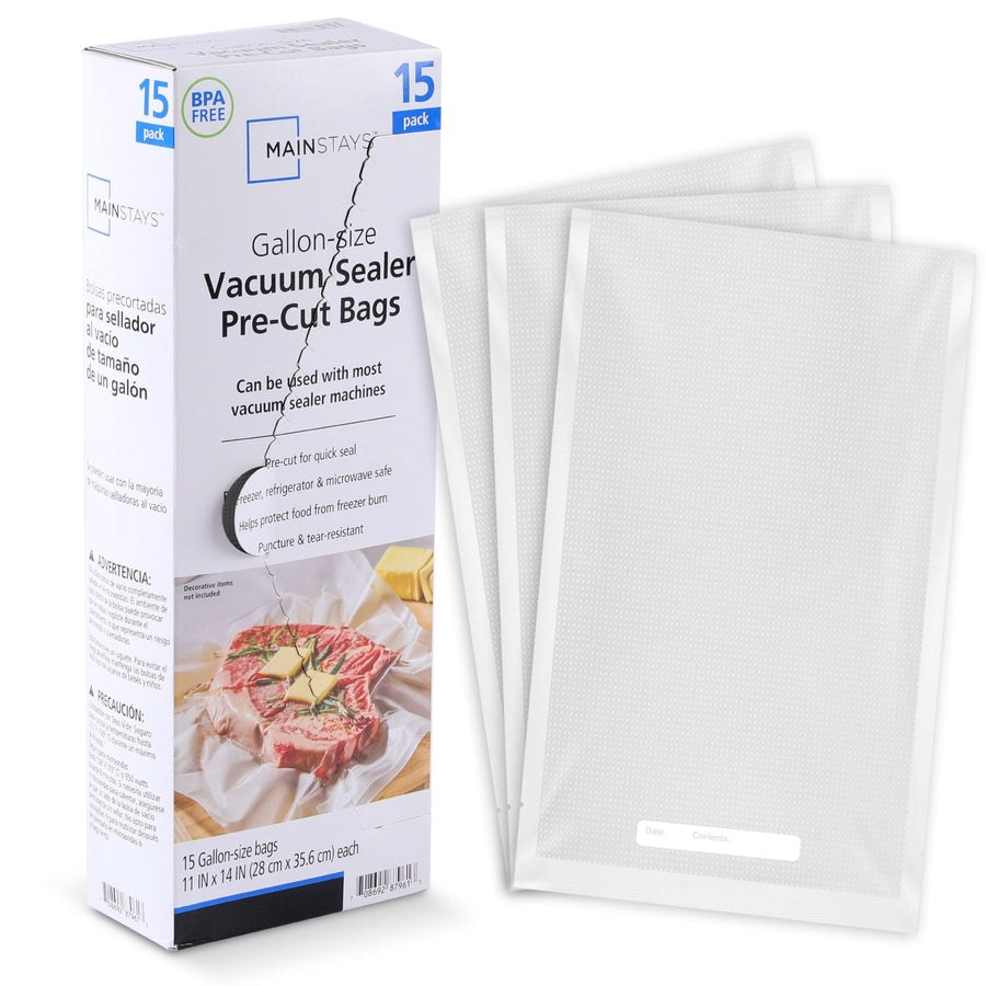 Box of Mainstays gallon-size pre-cut vacuum sealer bags displayed next to three textured clear vacuum bags