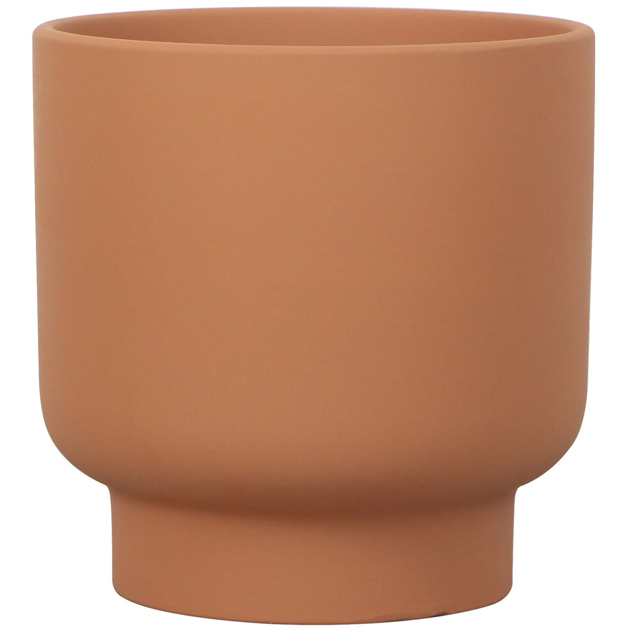 Smooth terracotta cylindrical ceramic planter with short pedestal base on white background.