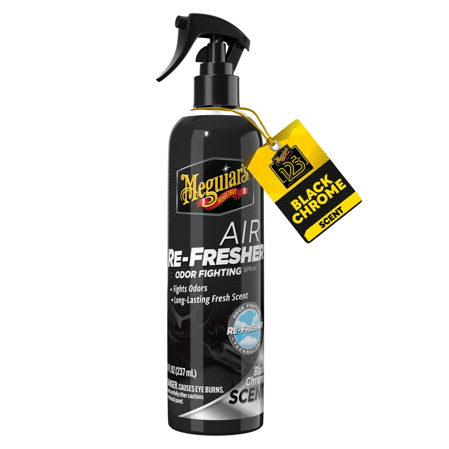 Tall black Meguiar’s Air Re-Fresher trigger spray bottle with a yellow Black Chrome scent tag on white background.