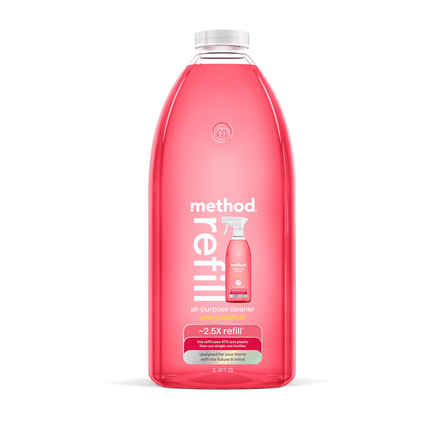 Tall clear plastic bottle of method pink grapefruit all-purpose cleaner refill filled with pink liquid