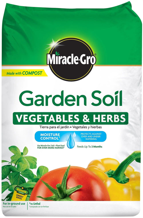 Close-up front of a Miracle-Gro Garden Soil bag labeled Vegetables & Herbs with tomato and pepper graphics