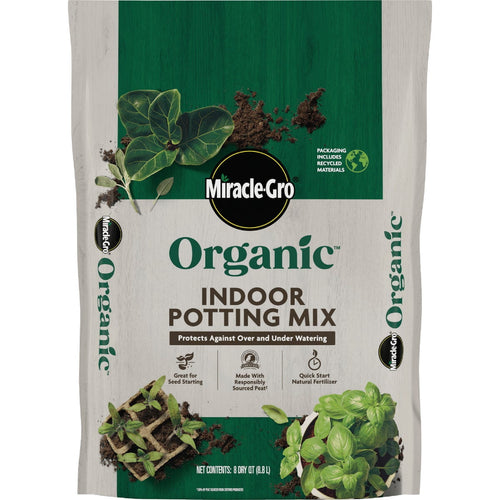 Miracle-Gro Organic indoor potting mix bag with plant and soil graphics on green and beige packaging