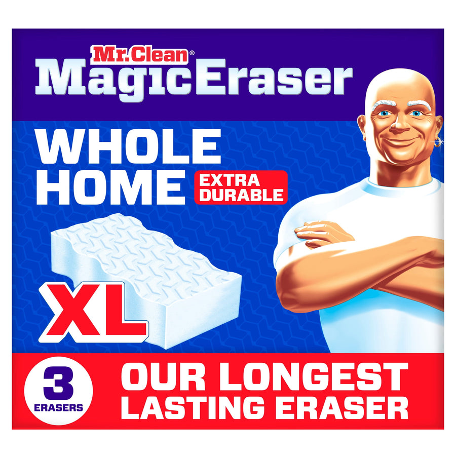 Bright product box front for Mr. Clean Magic Eraser Whole Home XL showing logo, sponge illustration and mascot on blue background.