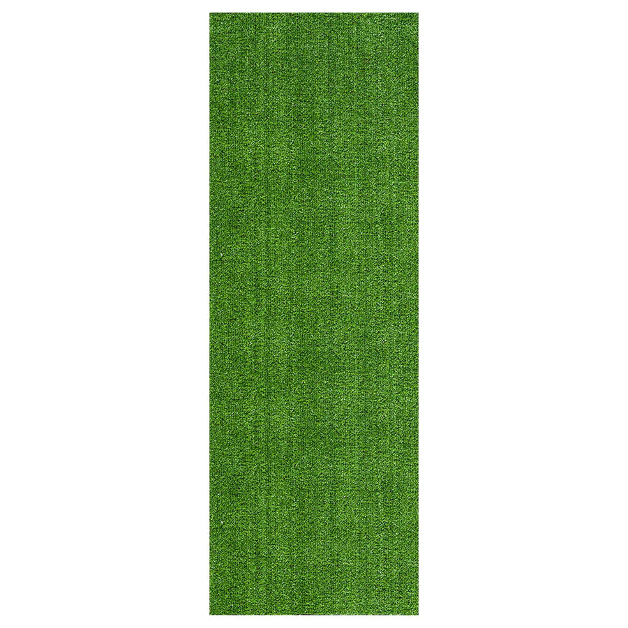 Top-down view of a narrow rectangular strip of bright green artificial grass turf on a white background.