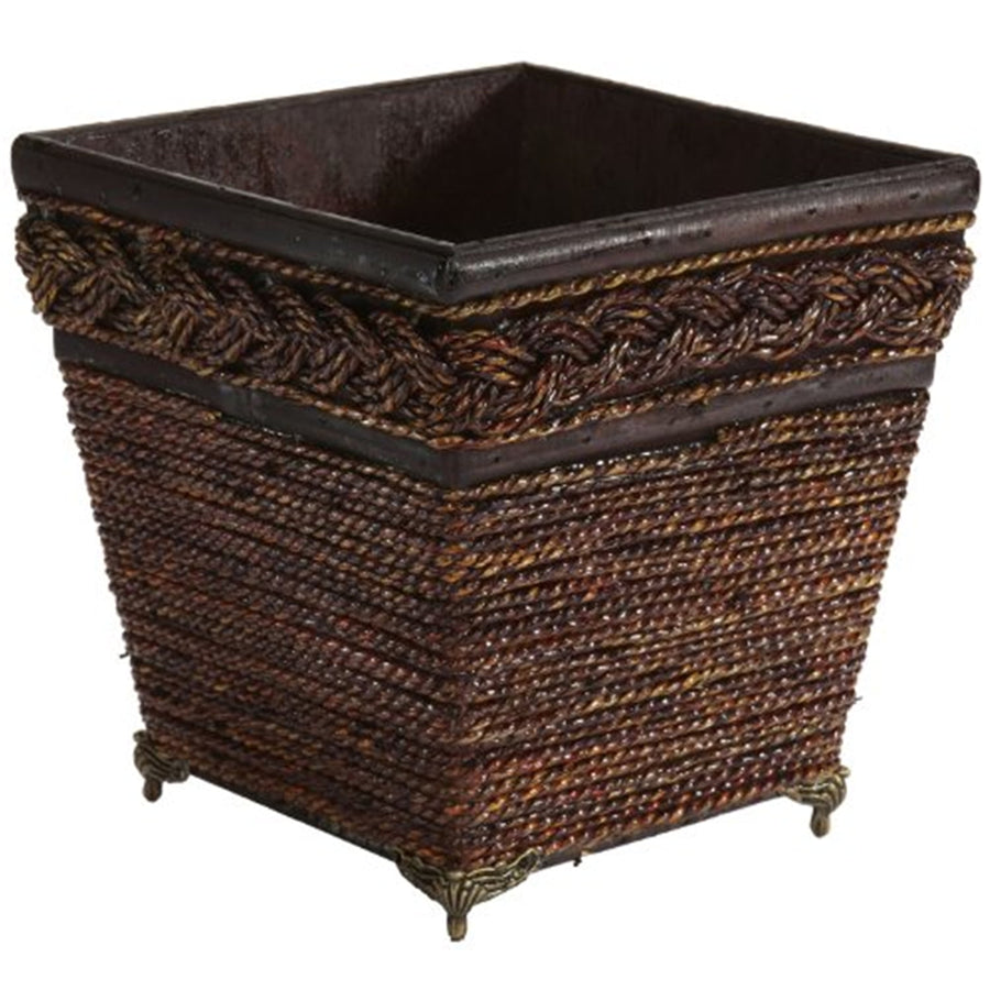 Square brown woven coiled-rope planter with braided top trim and decorative metal feet