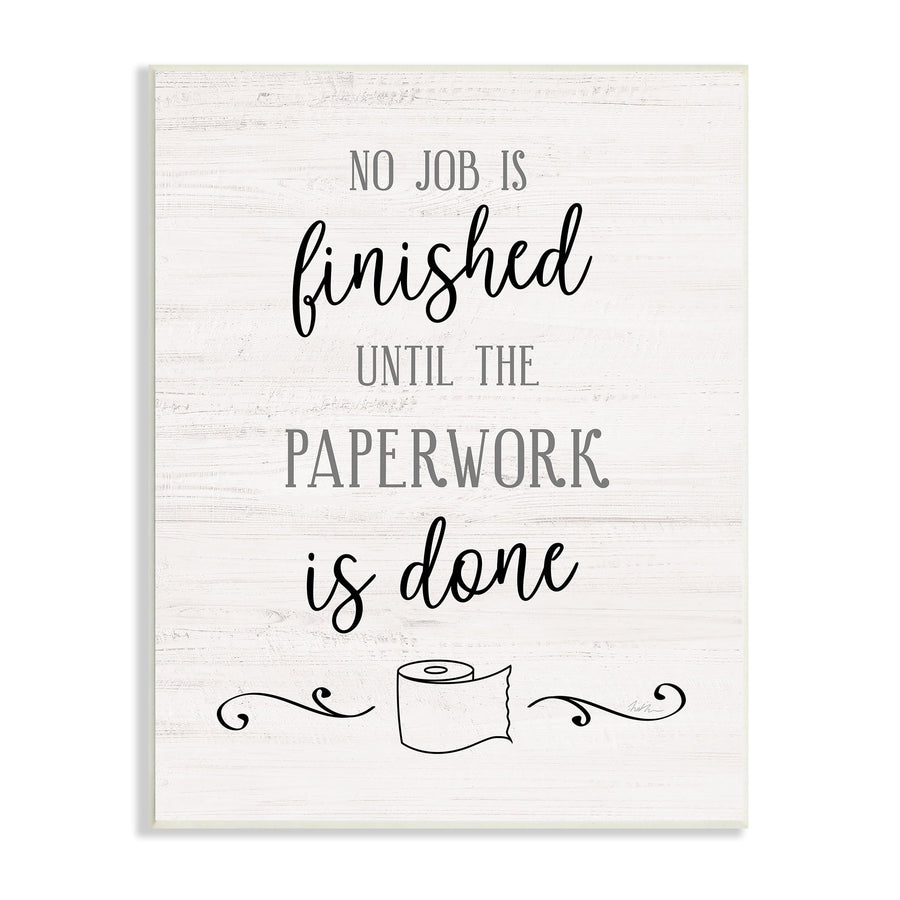 Light wood-textured wall plaque reading “No job is finished until the paperwork is done” with a small toilet-paper roll illustration
