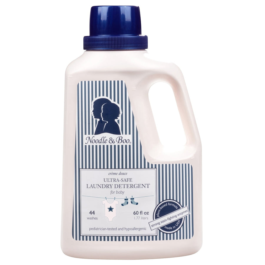 White bottle of Noodle & Boo Ultra-Safe baby laundry detergent with blue striped label and cap