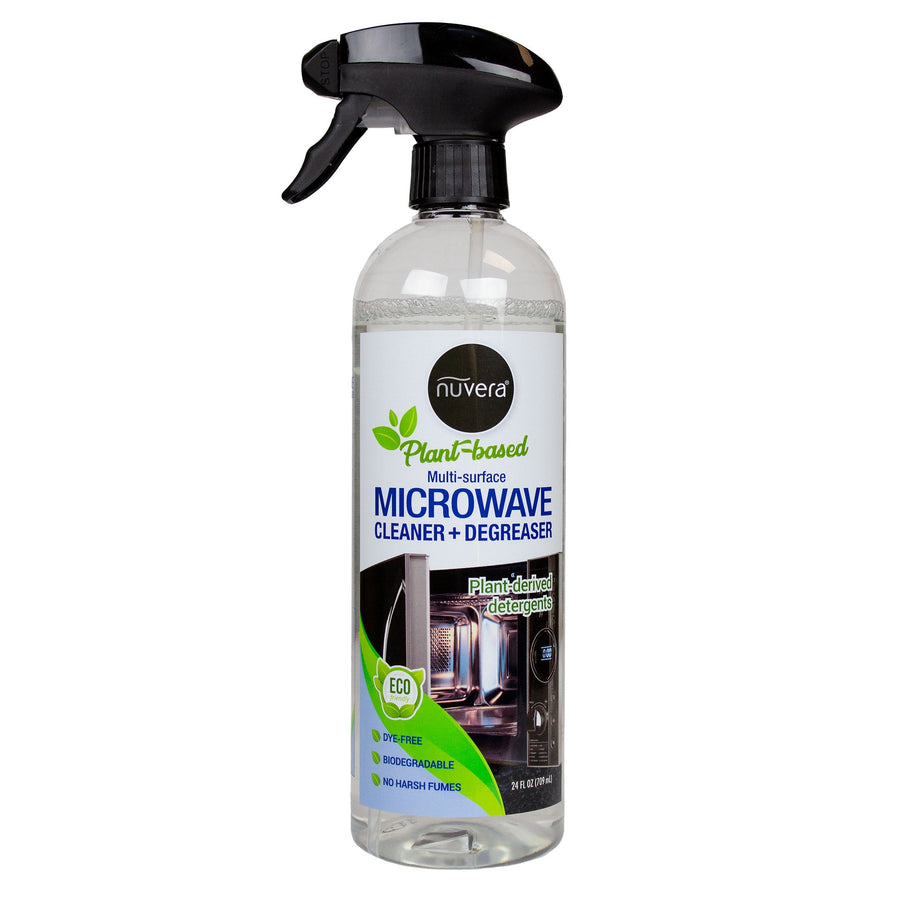 Clear spray bottle of Nuvera plant-based microwave cleaner and degreaser with front label visible