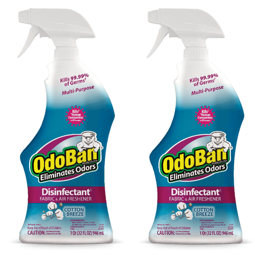 Two OdoBan cotton breeze disinfectant spray bottles side-by-side on white background