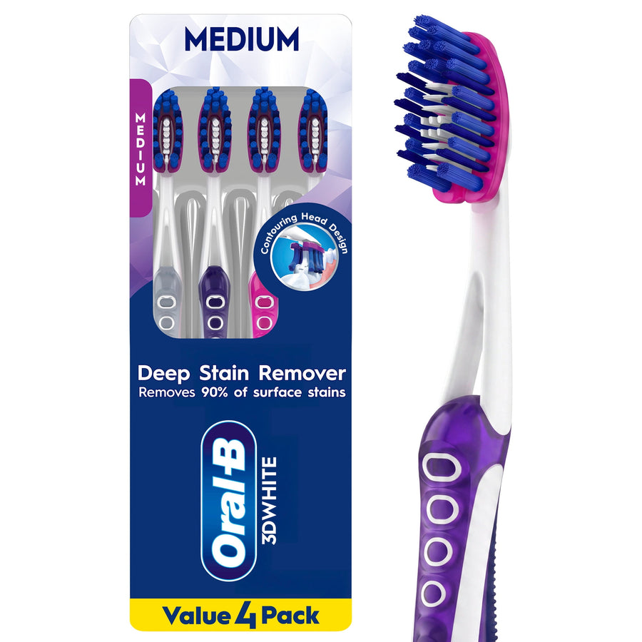 Oral-B 3D White medium toothbrushes in blister pack with purple and blue handles visible