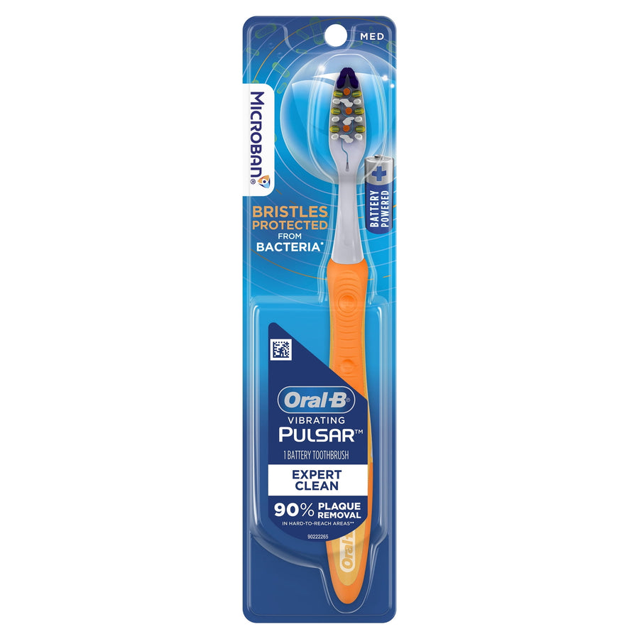 Oral‑B Vibrating Pulsar battery toothbrush in blister packaging with orange handle and blue product branding.
