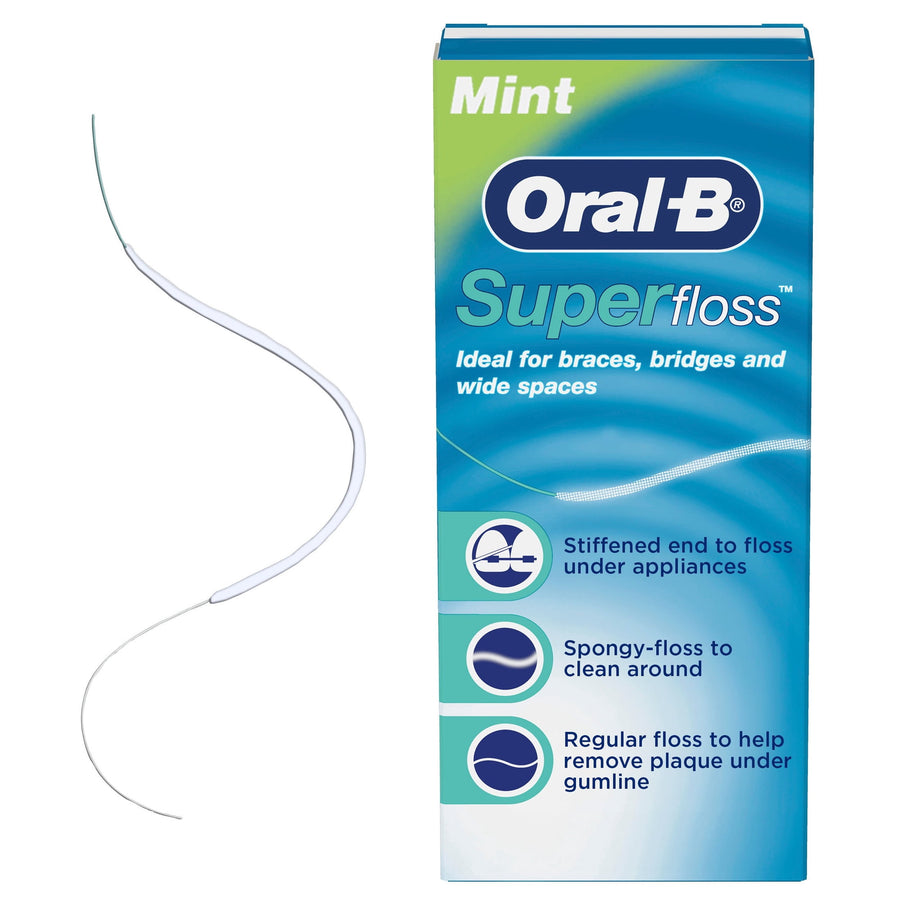 Oral-B Superfloss mint box alongside a single pre-cut floss strand with stiffened end visible.