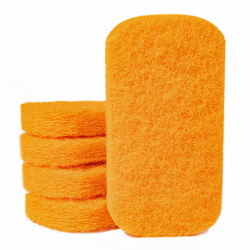 Close-up of a stack of bright orange rectangular scouring pads with rounded corners on white background.