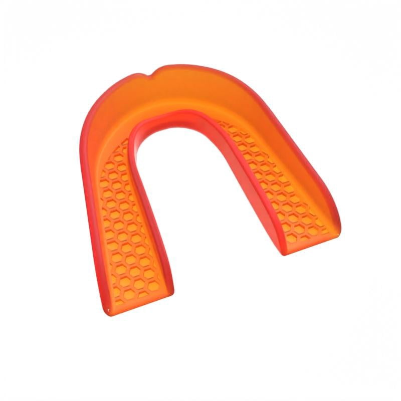 Close-up of an orange strapless mouth guard with honeycomb textured bite surface, shown on a plain white background.