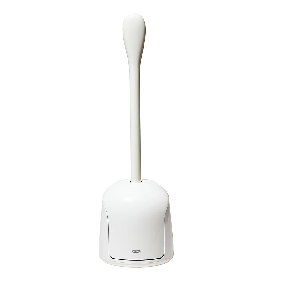 White OXO compact toilet brush standing in its matching canister on white background.