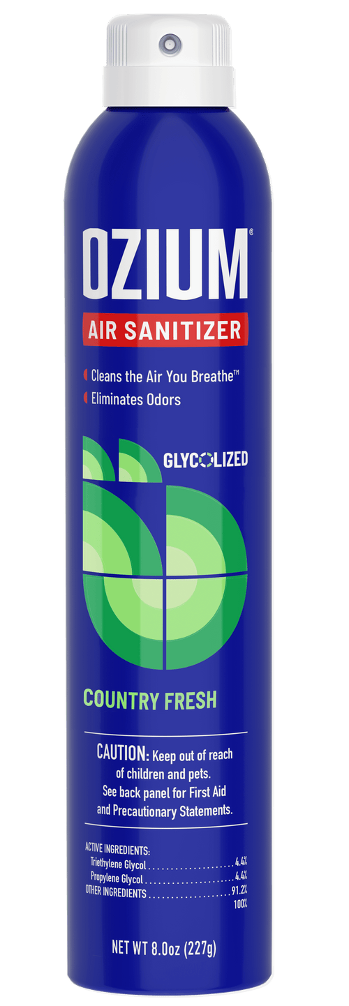 Tall blue aerosol can of OZIUM air sanitizer Country Fresh scent with white cap and green circular graphic
