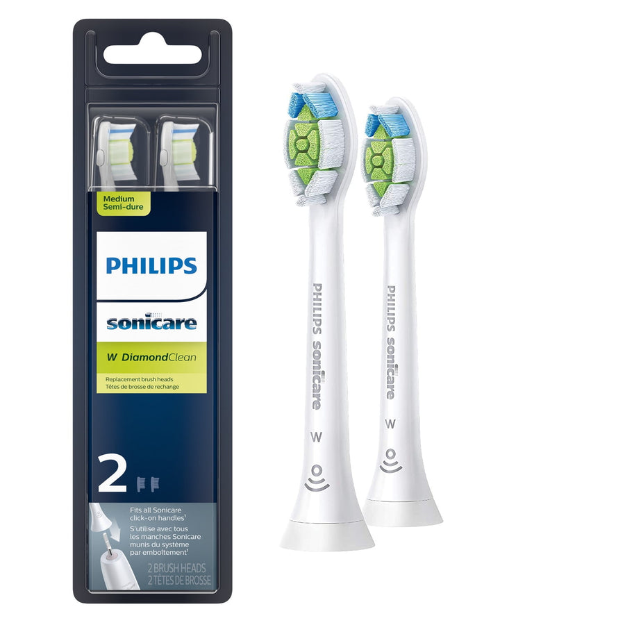 Two white Philips Sonicare W DiamondClean replacement brush heads beside their retail blister pack on a white background.