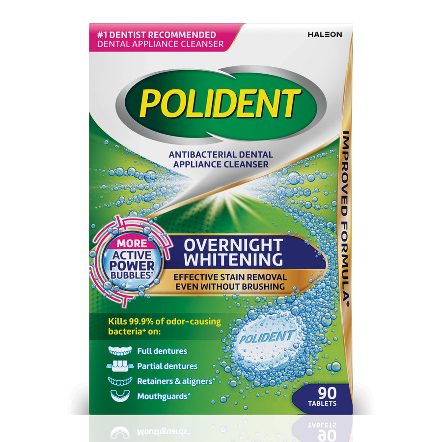 Polident overnight whitening cleanser box front showing logo, tablet illustration and claims about stain removal and antibacterial action.