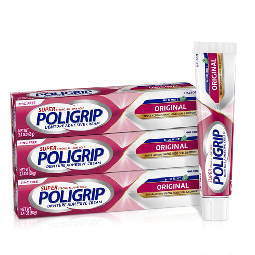 Three stacked Poligrip Original denture adhesive cream boxes with one tube standing upright on a white background
