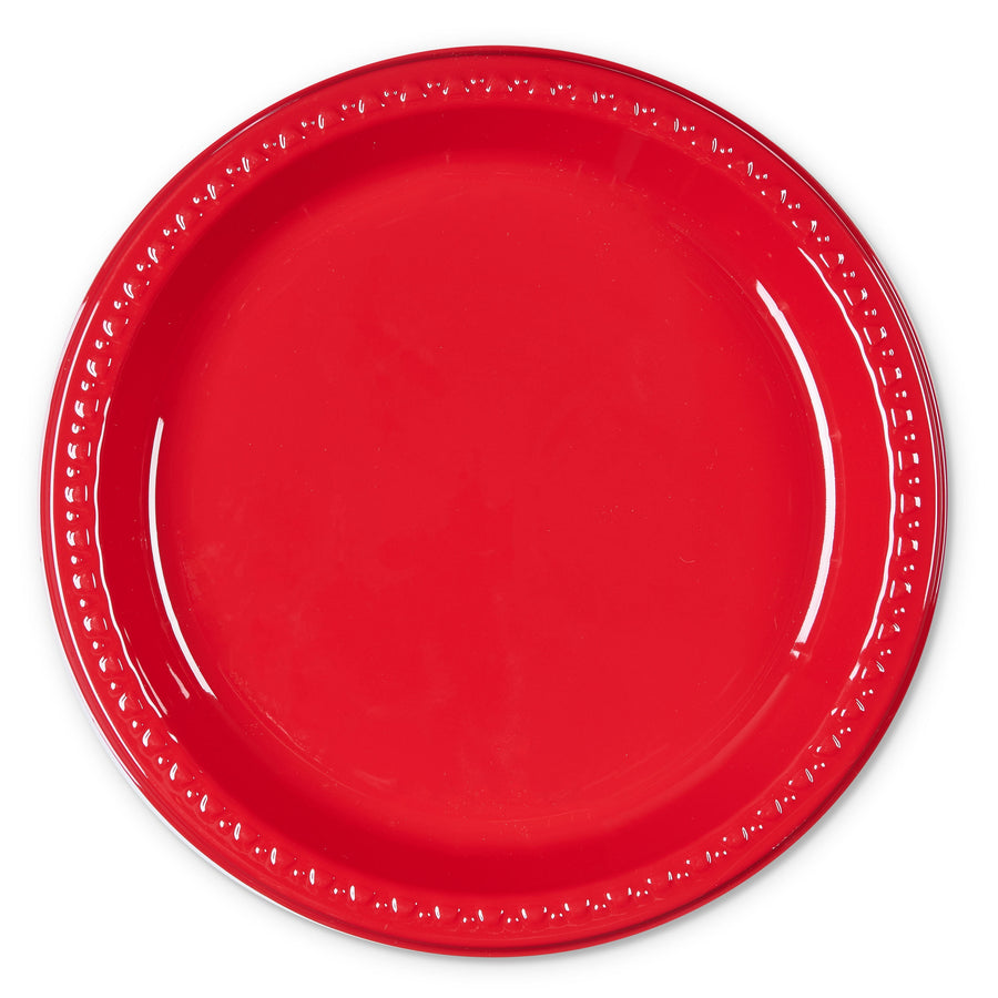 Single red plastic plate photographed flat on white background showing glossy finish and decorative rim