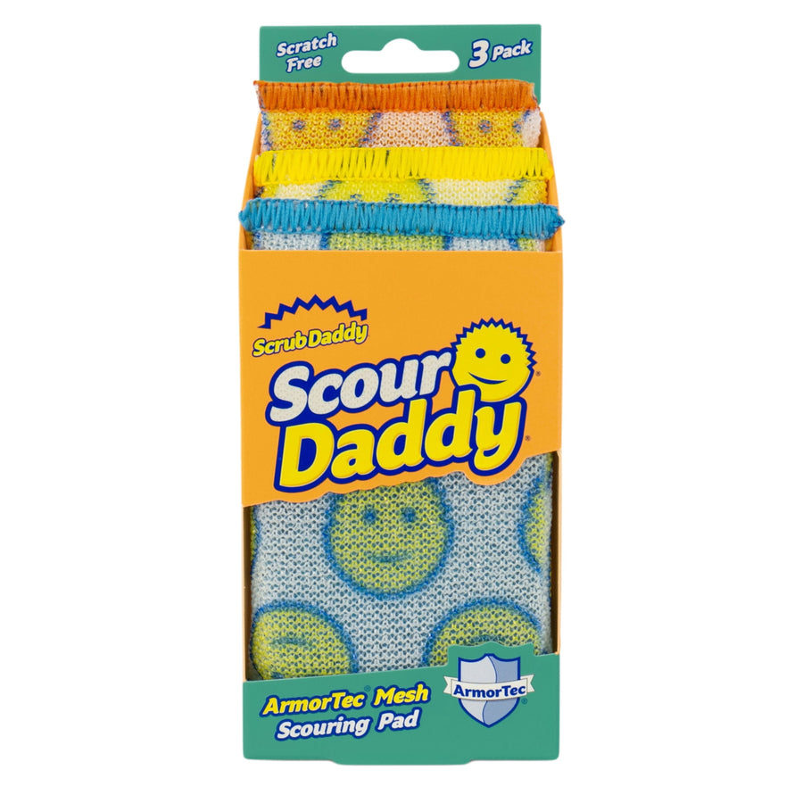 Packaged Scrub Daddy Scour Daddy mesh scouring pads in orange cardboard sleeve with smiley pattern visible