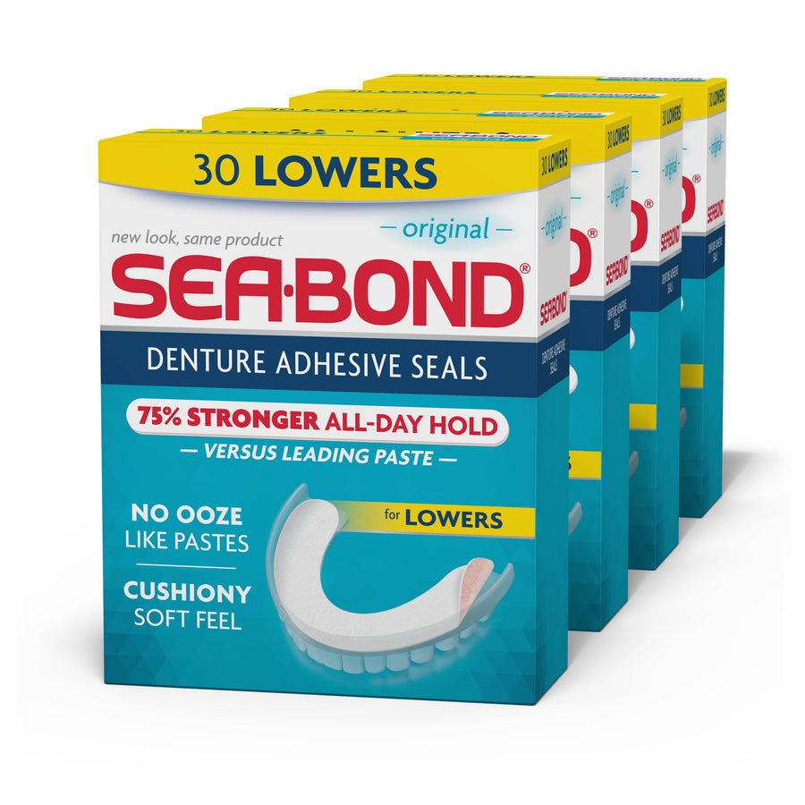 Four stacked boxes of SEA•BOND denture adhesive seals showing packaging front