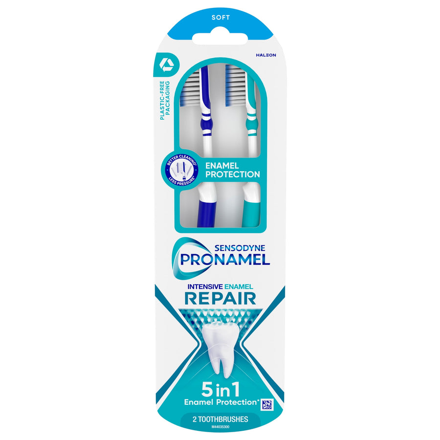 Packaged Sensodyne Pronamel toothbrush twin pack in white and teal carded blister with enamel protection branding