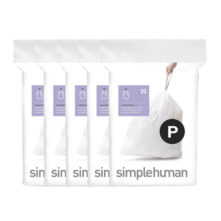 Five simplehuman dispenser packs shown side-by-side with a tied white trash bag and black 'P' size badge
