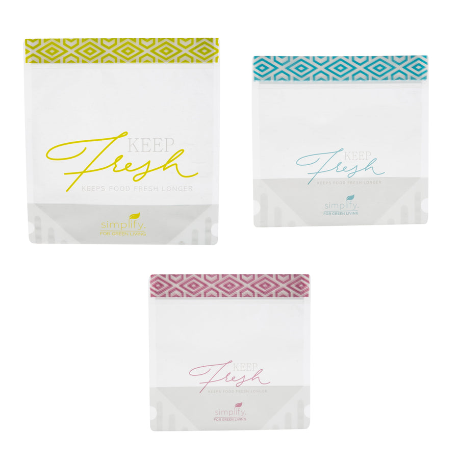 Three clear reusable stand-up snack bags with patterned colored zip strips and ‘Keep Fresh’ print.