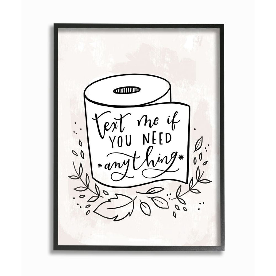 Framed Stupell print showing a hand-drawn toilet-paper roll with script text 'Text me if you need anything' and decorative leaves.
