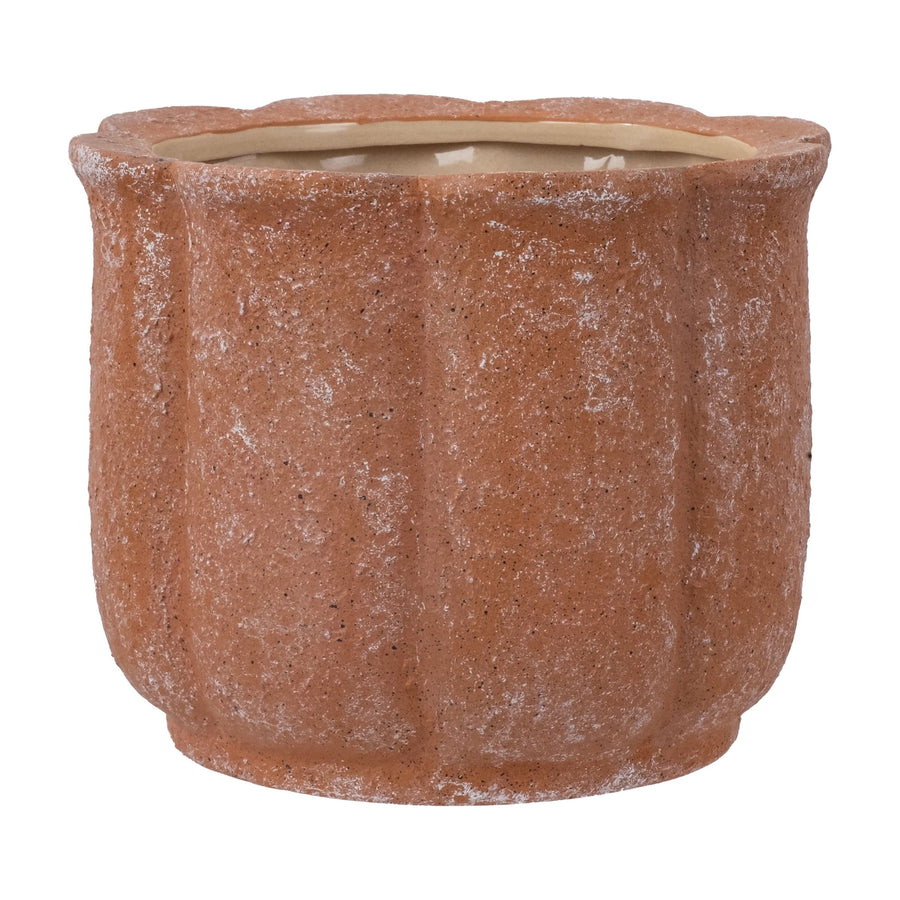 Terracotta scalloped ceramic planter with textured weathered finish, straight-on view showing interior rim.